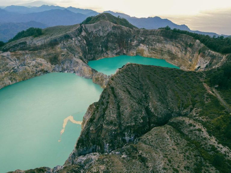 Three crater lakes of Mount Kelimutu with different colors at sunrise Flores Indonesia